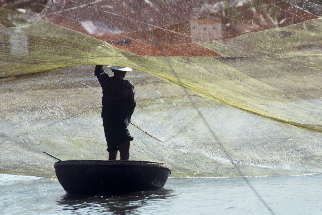 Fisherman in the Mekong Delta, Vietnam. The Mekong runs through China, Myanmar, Laos, Thailand, Cambodia and Vietnam, and is the primary source of protein for 60 million people. © Elizabeth Kemf / WWF-Canon
